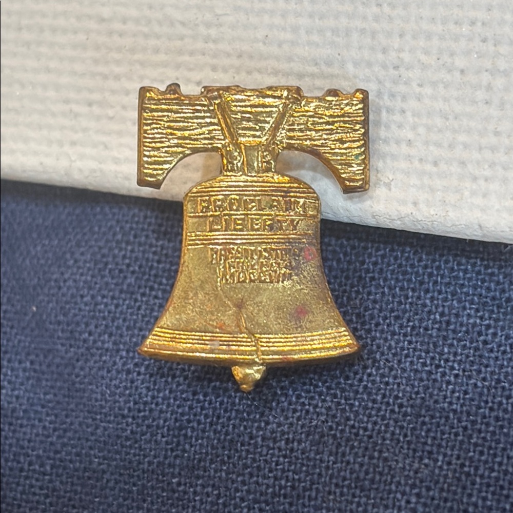 Vintage liberty bell, Woodmen of the World and Baptist pins